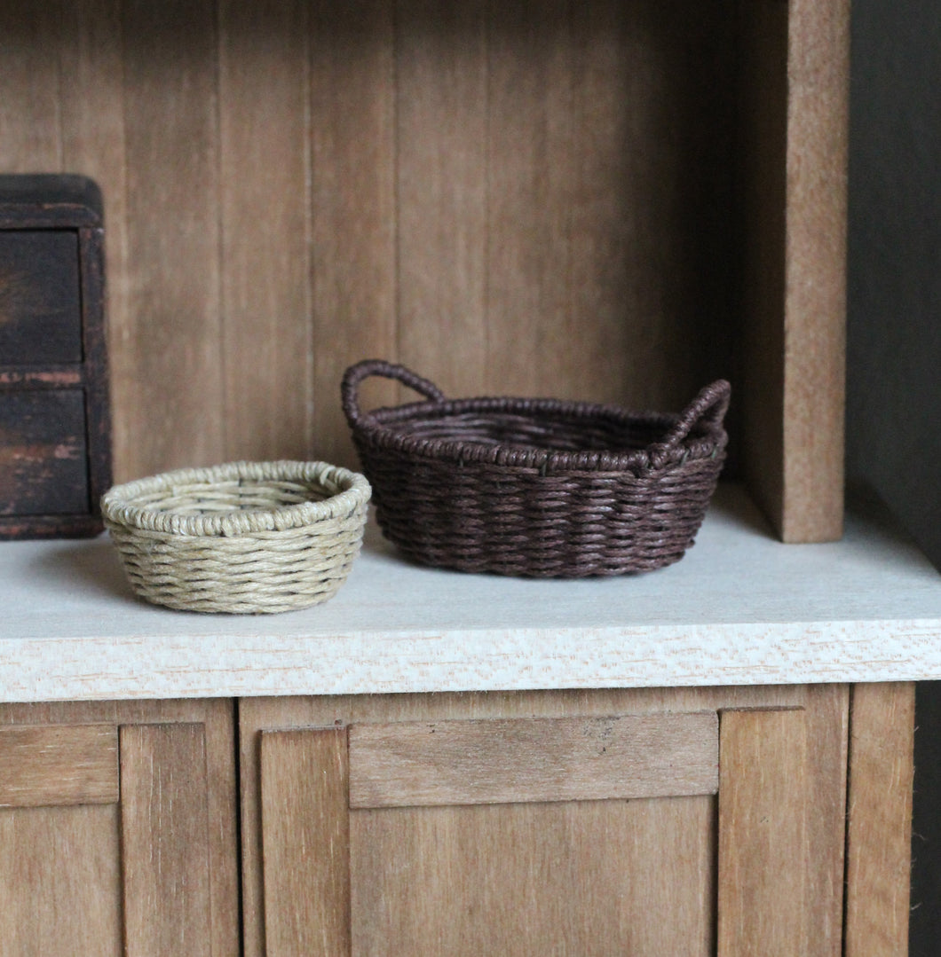 Set of two hand woven baskets